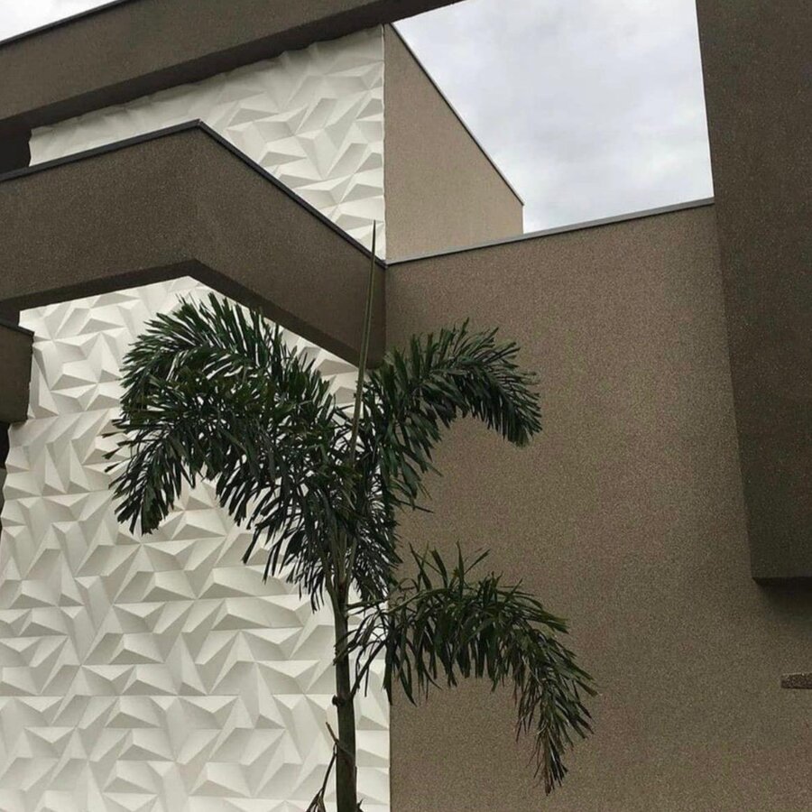Parede externa com revestimento acrílico de pedras naturais